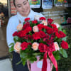 Red and peach roses, Alstromerias, carnations in a luxury box 