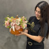 Fresh Flower Mix in a pumpkin. Delightful piece for your festive table.