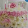 Our signature floral birthday cake may look good enough to eat, but