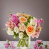 The Peach Paradise bouquet is a  lovely combination of peach and