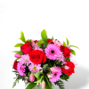 Colorful large vase with a variety of flowers. 