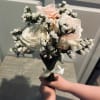 3 fresh cut roses of your color choice delicately prepared and arranged