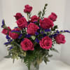 1 dozen long stem roses. We offer colors in pinks, lavender, white