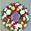 A large display of roses, spray roses, hydrangeas,
lilies ,carnations and more, approximately