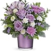 Experience the enchantment of blooms delivered! Purple roses in a polished gem