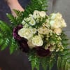 Ideal for weddings, brides maids, proms and dances.  Arranged with roses