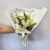 Condolence bouquet: a beautiful bouquet with white roses and lilies of the