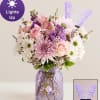All-around arrangement of pink roses, Peruvian lilies (alstroemerias), cremons, and waxflower; white