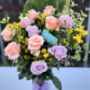 Sweeten someones day with this charming arrangement. Perfect for a cute surprise!