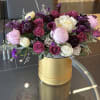 A harmonious blend of purples, pinks, and wine-colored hues.