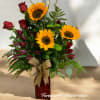 Brighten someone&rsquo;s day with this cheerful floral arrangement! Featuring radiant sunflowers as