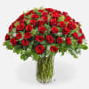 
Indulge in the timeless beauty of 100 exquisite roses, elegantly arranged with