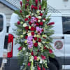 A standings flower arrangement for a funeral service is a heartfelt tribute