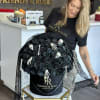 100 rare black roses in a large signature box decorated with skeletons