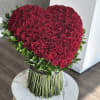 A breathtaking heart-shaped arrangement of 150 red roses, thoughtfully designed to stand