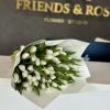 A stunning arrangement of 50 white tulips will enhance any occasion.