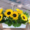 - 8 Sunflowers
- 3 Stems Hypericums
- Greenery
- 12 x 4 Inches Wooden