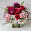The Red in Romance bouquet features an ensemble of velvety red roses