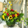 This Unique Design includes red roses, sunflowers, dianthus green trick, wheat, crespedia