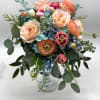 This bouquet is designed in a cascading style. It is made up