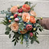 This bouquet is designed in a cascading style. It is made up
