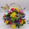 Designed out of white carnations, this puppy is sure to put 