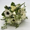 Lush whites with the beautiful pop of a white anemone with dark
