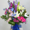Blue vase in shades of pink, purple, white, and blue. 
Appropriate for