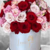 Our exclusive designs of fresh flowers in beautiful round boxes are a