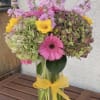 This delightful arrangement is a perfect blend of happiness and charm! 