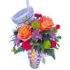Tumbler featuring color coordinating flowers including roses, carnations, cushions, and thistle. Flowers