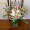 A mixed fresh cut consisting of White Hydrangea, White Roses, Light Pink