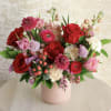 Full of a variety of shades of red, pink, and blush, this