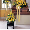 All fresh flowers. One casket spray.one standing easel and one floor vase.