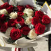 The photo shows the deluxe size 

Standard size - 12 roses
Deluxe size