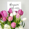 Arrangement of White Hydrangeas, Color Tulips and Greens.  

Approximately  10&#039;