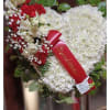 This bleeding heart easel is heart shape made of white pompom daisy