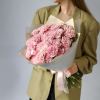 A cute bouquet of fresh carnation, perfect for any occasion. Wrapped in