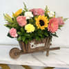 Buyer will receive a Carretita with mix flowers