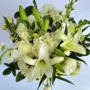 All white premium flowers with limited greenery will be used to design