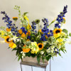 Wonderful seasonal flower box with fresh flowers in a mix of yellow