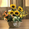 Brighten any space with the Sunny Basket &mdash; a cheerful arrangement of