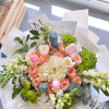 A wrapped Bouquet using the freshest flowers of the day. 
PLEASE NOTE: