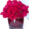 This stunning arrangement is packed with twelve (12) beautiful and fresh red