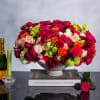 In a low, ceramic vase, a stunning symphony of colors and textures