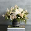This gorgeous array of white peonies and exotic tinted dutch sweet peas