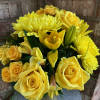 The &quot;Golden Anniversary&quot; arrangement is a vibrant and elegant display of sunshine