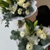 chic bouquet with lilies, ranunculus and roses