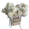 Unusual exotic basket with white flowers
