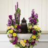 This vibrant sympathy arrangement offers a beautiful expression of love and remembrance.